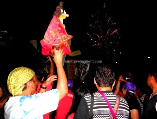 Viva Sto. Niño, raising Holy Infant Jesus while revelry making, partying, crowds, Kalibo Ati-atihan Festival 2014